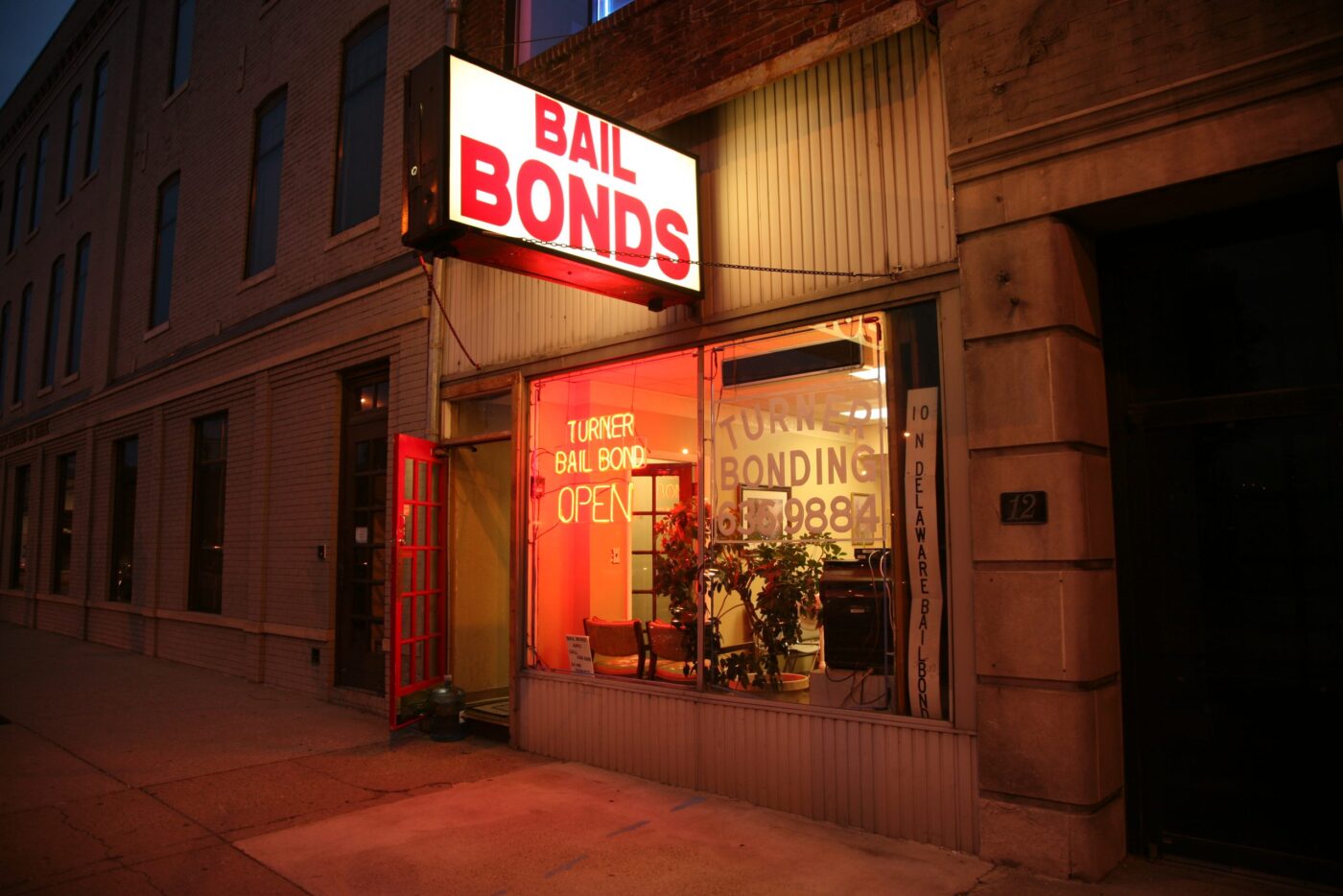 bail bond store front at night