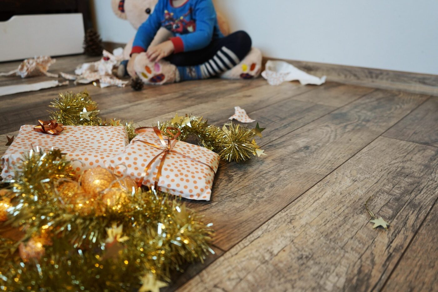 Christmas presents on wood floor