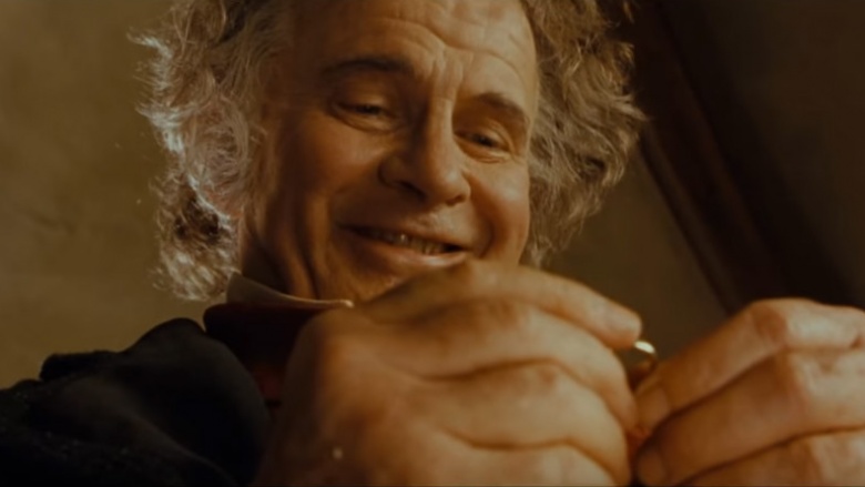 Bilbo holding the One Ring